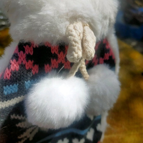 Winter hat used with fluffy pom-poms