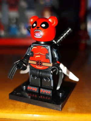 Pandapool figure like new with stand and back sheath