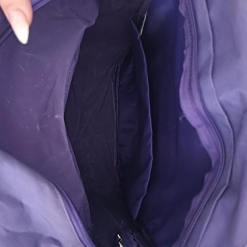 Backpack used, purple color