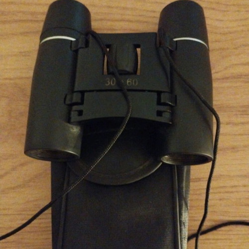 Binoculars like new with case, unused