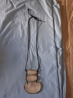 Statement necklace used with 3 stacked oval mother-of-pearl pendants