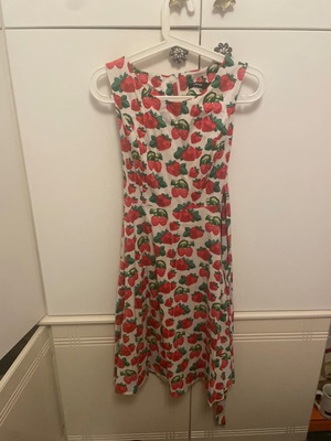 Women's dress with strawberries, below knee length, with belt