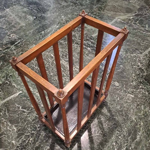 Vintage wooden umbrella stand used for hallway