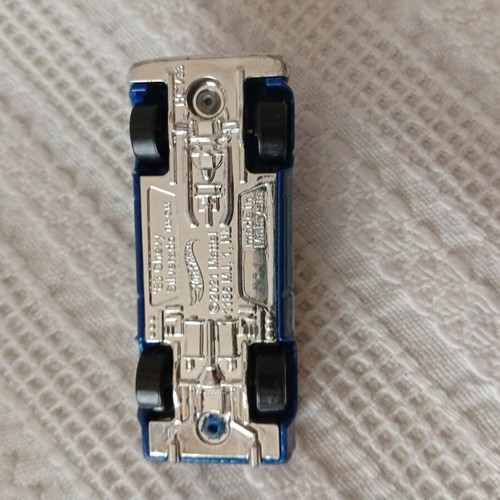 Hot Wheels Chevy Silverado and Chevrolet Silverado EV toy cars like new, pack of 2