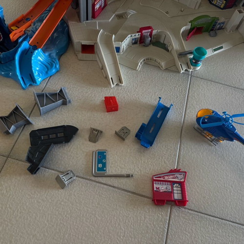 Hot Wheels Mega Garage playset used with Fast Blast Car Park and truck