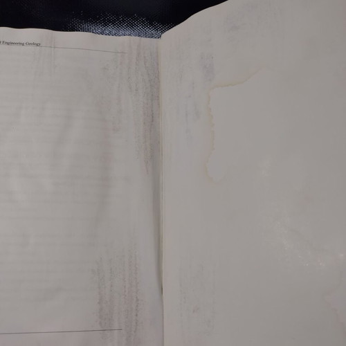 Environmental Engineering Geology book used with moisture marks