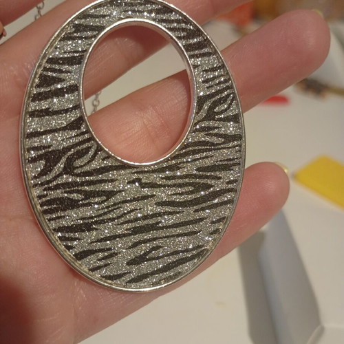Avon Animal Magnetism pendant new with zebra print