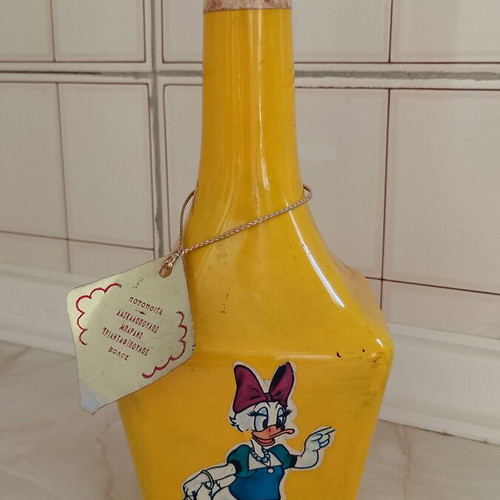Vintage Vermouth Bottle with Daisy Duck Label like new