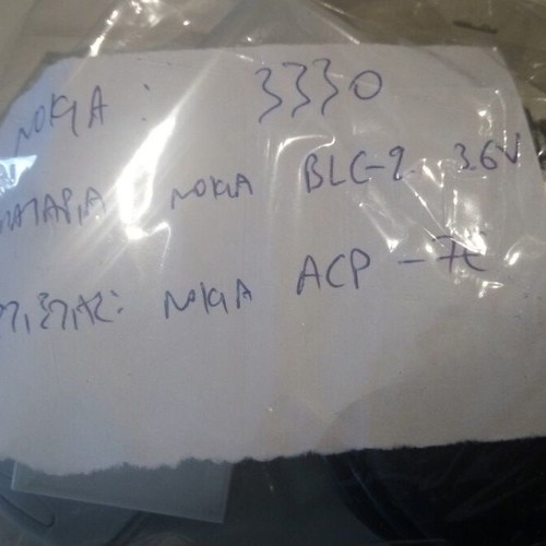 Nokia 3330 used, white with Greek menu, battery and charger