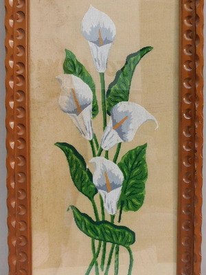 Embroidered painting with protective glass and carved wooden frame