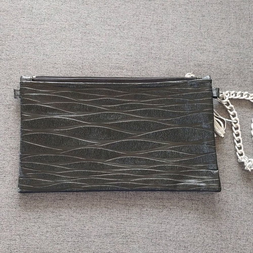 Handmade black wrist bag new from embossed leatherette