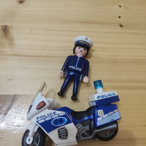 Playmobil police figure with motorcycle like new