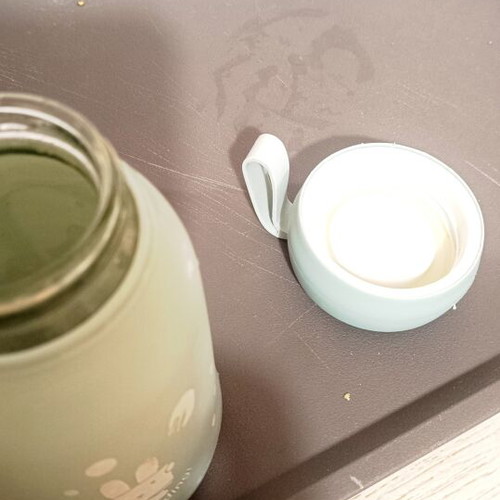 Glass cup with plastic exterior and leak-proof lid like new