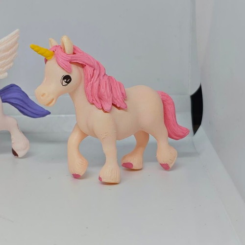Set of 4 unicorn and pegasus figures like new