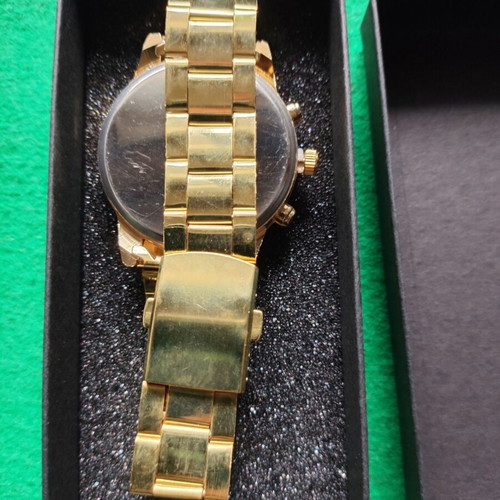 Geneva watch in gold color with black dial like new