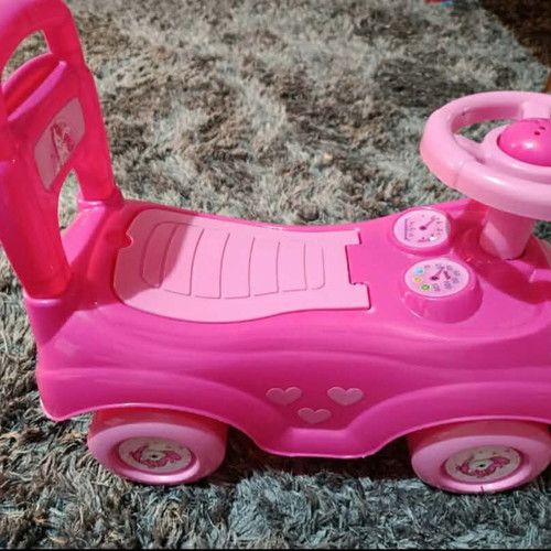 Pink children's toy car used