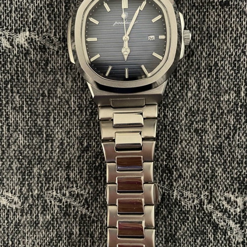 Men's watch metal bracelet like new, luminous and date display