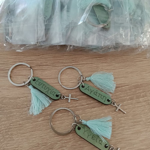Martyrika keychains new, pack of 49 with silver ring and cross