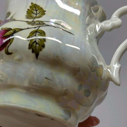Porcelain sugar bowl with roses and gold trim like new