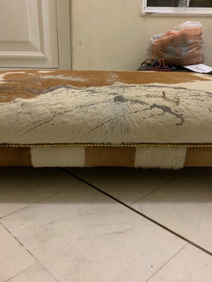 Natural cowhide ottoman used condition
