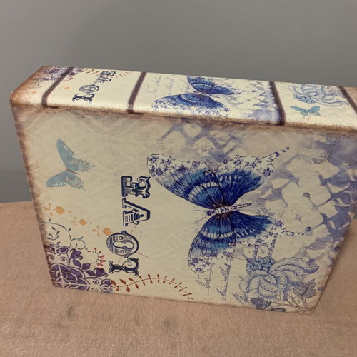 Vintage storage box with butterfly and flower design