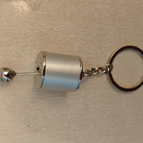 Silver car gear shift keychain