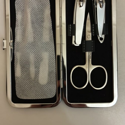 Max Factor nail care set with scissors, clippers, file, tweezers, cuticle tool