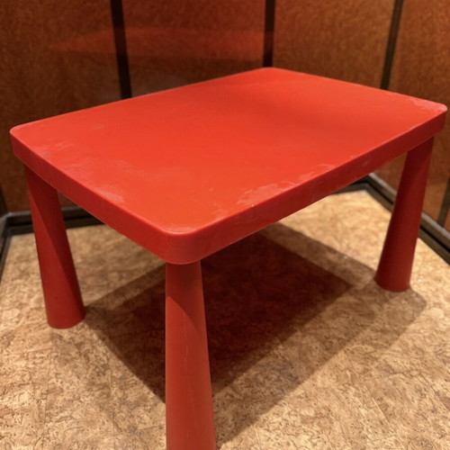 Children's red plastic table used, ideal for play and crafts