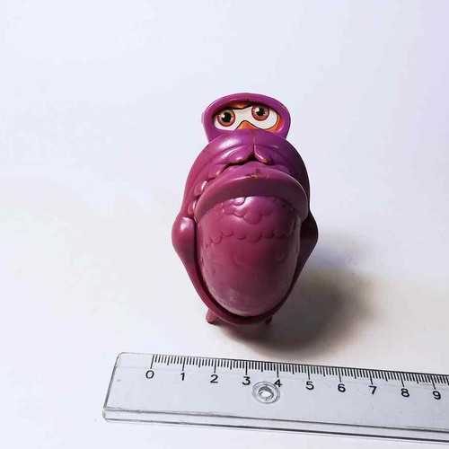 Plastic toy purple fish used with closing mouth