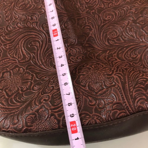 Women's brown shoulder bag used with embossed design