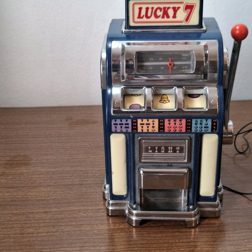 Marksman Las Vegas Lucky 7 AM/FM radio used, one armed bandit slot machine
