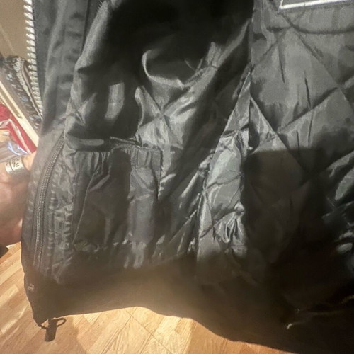 Women's motorcycle jacket used with lining and protectors
