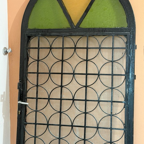 Solid iron door with panel, opening