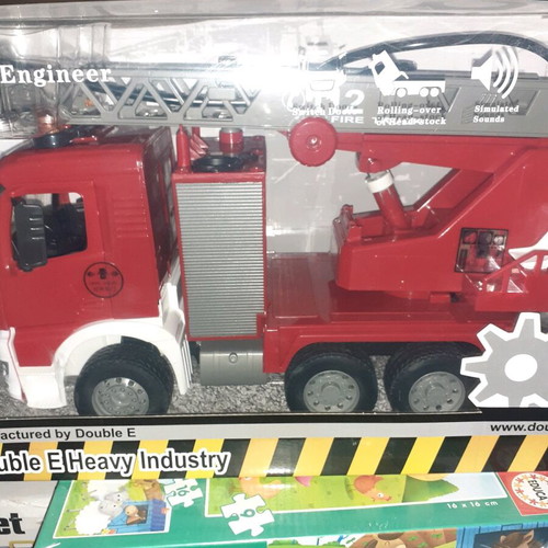 Toy truck new red with ladder, lights and sounds