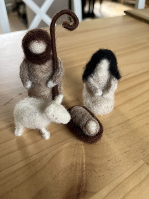 Woolen nativity scene with Mary, Joseph, baby Jesus and lamb