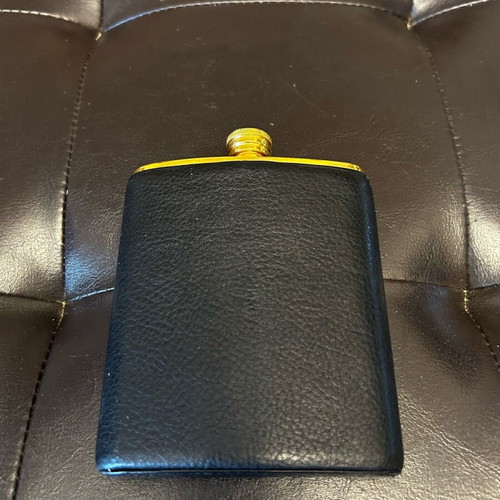 Flask like new, approximately 200ml