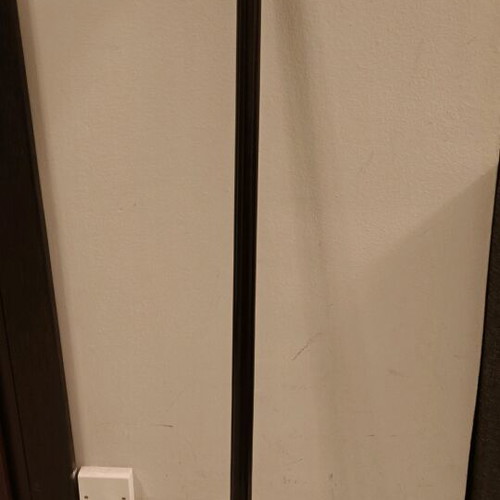 Wooden handmade cane used, black with wear marks