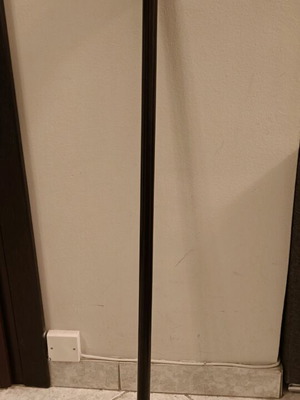 Wooden handmade cane used, black with wear marks