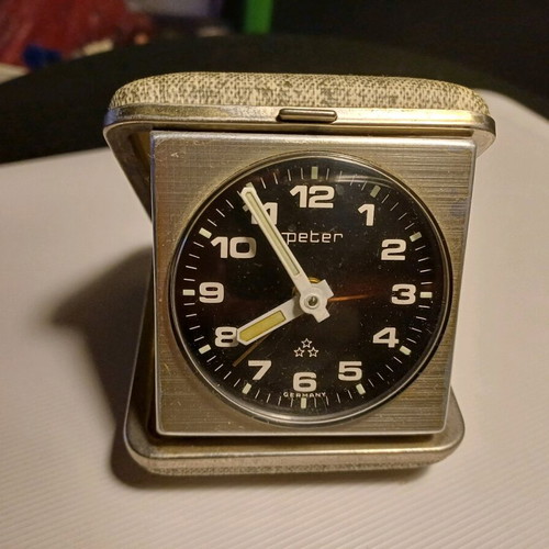 Peter wind-up travel clock used, analog table clock