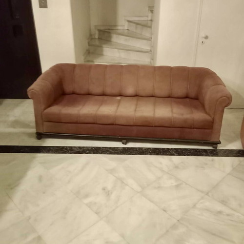 Four-seater sofa with wheels used