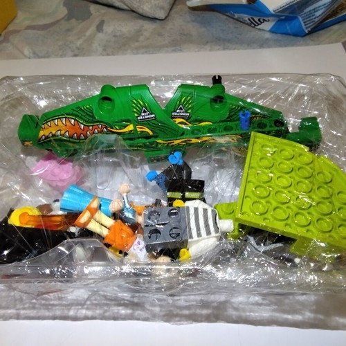 Lego figures, accessories and pieces used, all together