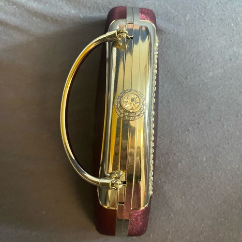 Evening handbag with extra chain for crossbody wear
