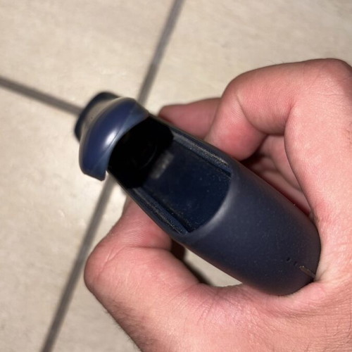 IQOS ILUMA i Midnight Black used with base and holder