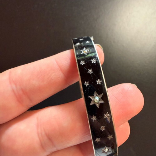 Vintage black bracelet cuff with stars used