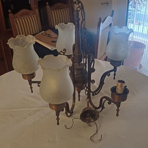 Antique chandeliers used, two pieces with missing crystal covers