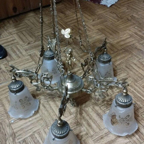 Bronze five-light chandelier used with broken glass