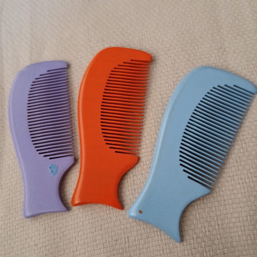 Wooden combs with handmade painted designs