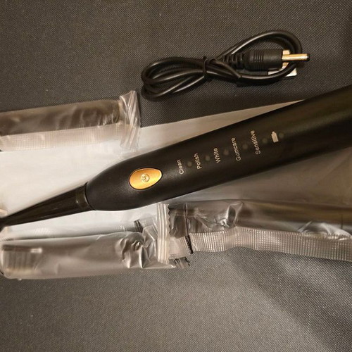 Sonic Toothbrush new with 3 replacement heads