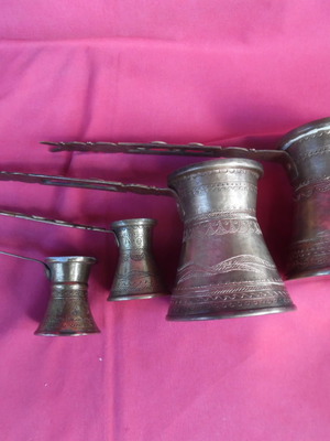 Set of 4 handmade carved Greek brass briki coffee pots