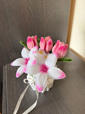 Delicate tulip and lily arrangement in plaster pot custom made